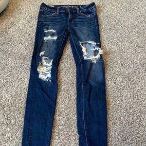 Ripped dark jegging!